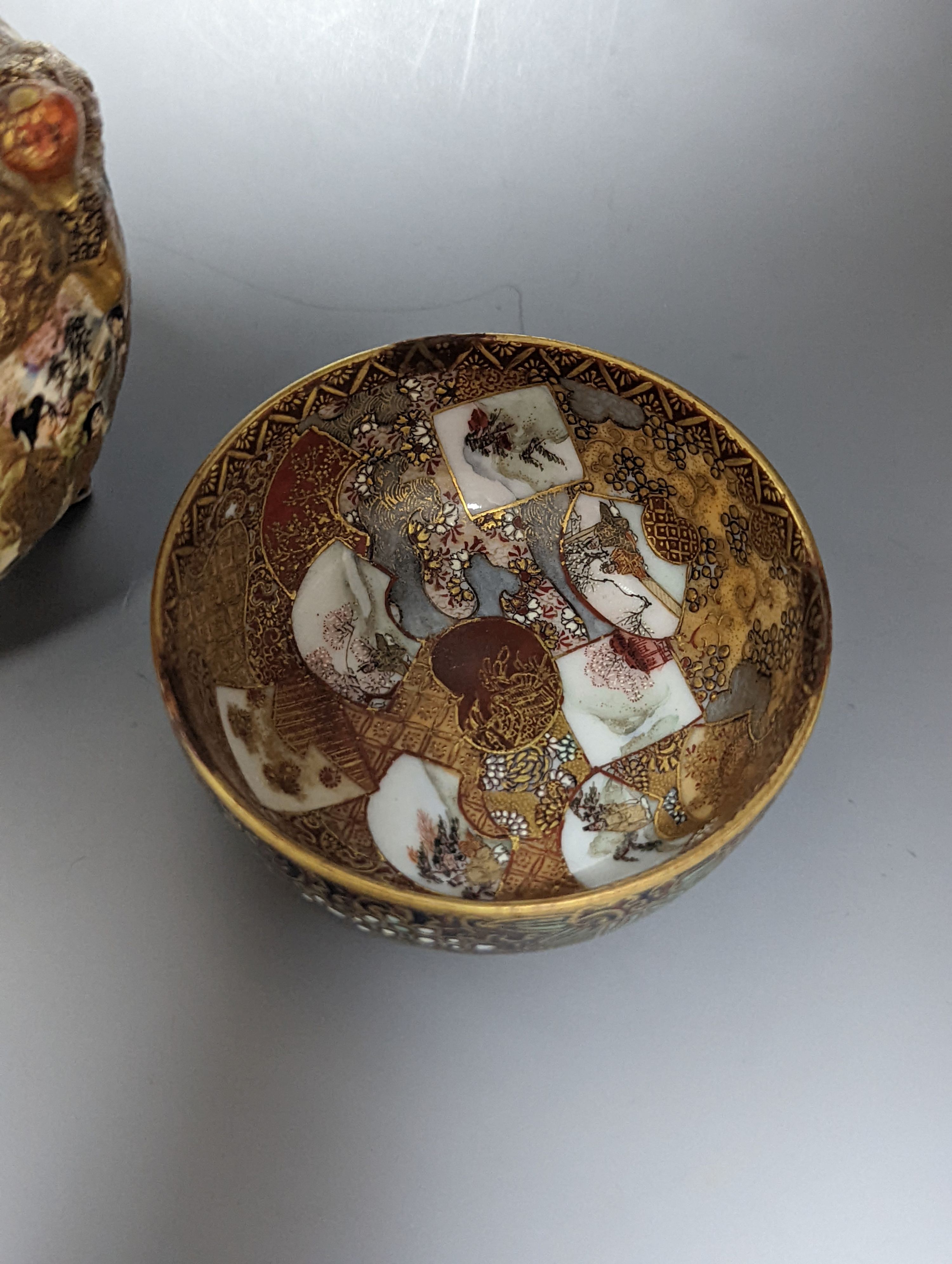 A Satsuma globular jar, 7.5cm., and a Kutani bowl, both signed